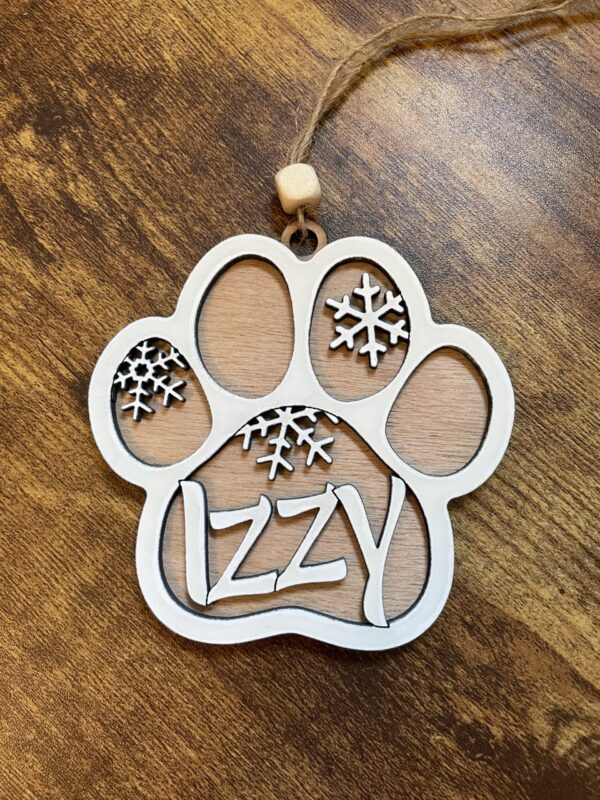 Paw Print With Snowflakes Ornament / Magnet